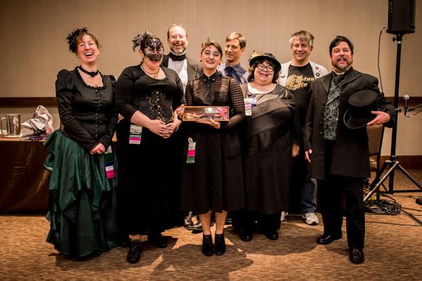 A group of singers in costume at Arisia, photo by Cat Trzaskowski